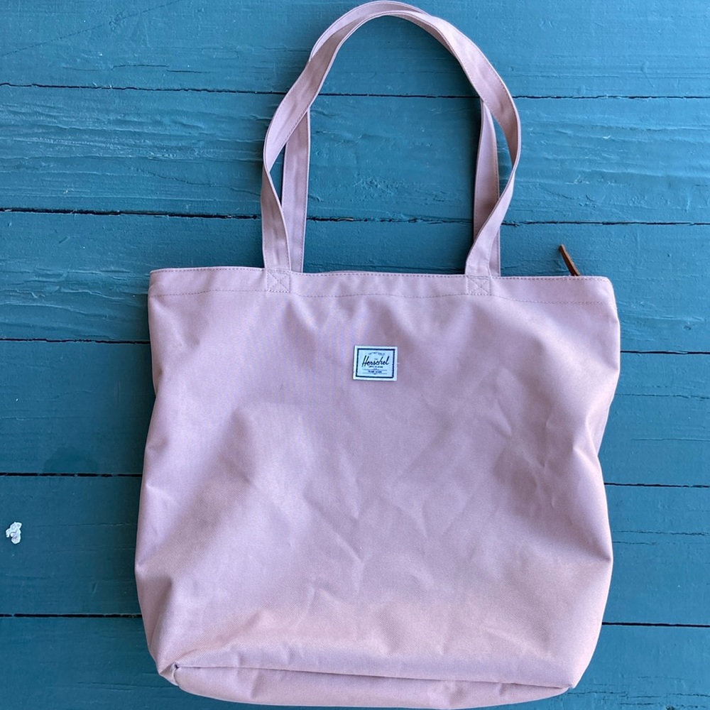 Herschel Supply Co. rose colored canvas tote bag.